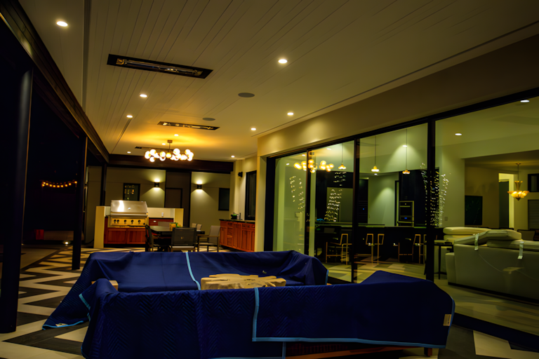 Exterior dining area illuminated at night