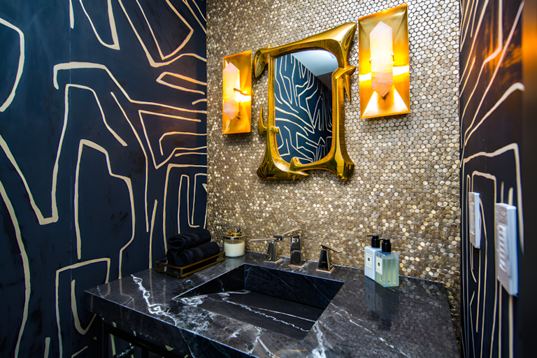Bathroom with gold accent fixtures